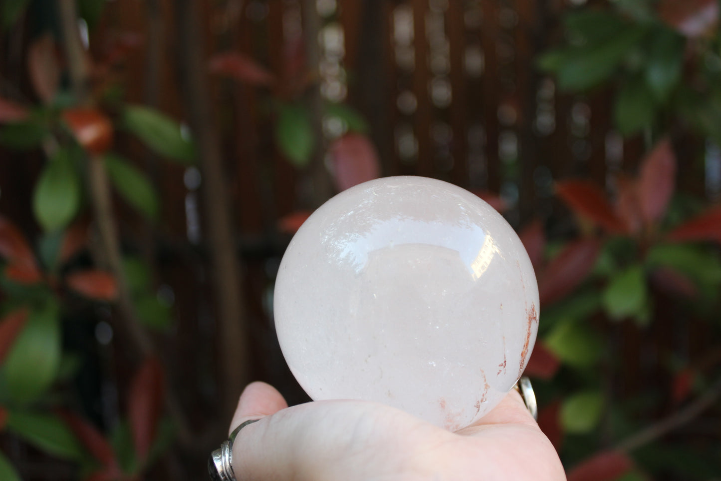 Large Clear Quartz Sphere With Hematite Inclusion